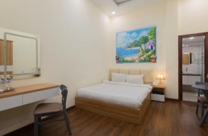 Voodi või voodid majutusasutuse Tasme Hotel toas