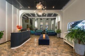 The lobby or reception area at Tasme Hotel