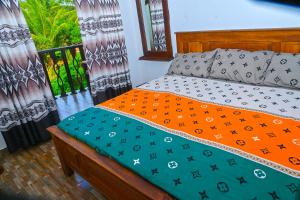 Postel nebo postele na pokoji v ubytování Vindiw Holiday Resort