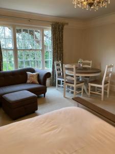 a living room with a couch and a table at Gallows Hill in Scarborough