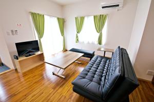 Μια τηλεόραση ή/και κέντρο ψυχαγωγίας στο JOUJI HOUSE