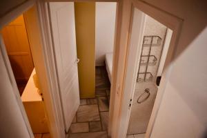 an open door to a hallway with a room at Serifos Rock Villa in Serifos Chora +14 photos