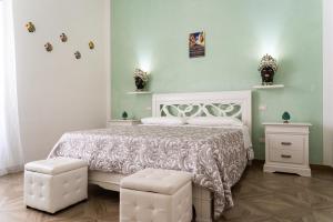 Postel nebo postele na pokoji v ubytování Portosalvo Rooms