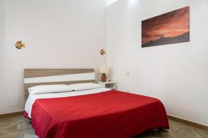 Postel nebo postele na pokoji v ubytování Portosalvo Rooms