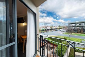 a balcony with a view of a street at Griffin 175 in Kingston 