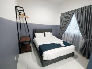 Ein Bett oder Betten in einem Zimmer der Unterkunft ForestNest Cameron Town Spacious 3R3B (1300 sqft)