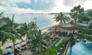 an aerial view of a resort with a pool and a beach at Bandara Spa Resort & Pool Villas, Samui in Bophut