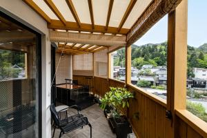 Balkón nebo terasa v ubytování Arima Onsen ShikinoIrodori Hatago