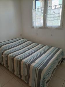 Ένα ή περισσότερα κρεβάτια σε δωμάτιο στο Chalet La Mer Veille 2