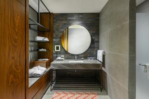 a bathroom with a sink and a mirror at Elite World Grand Sapanca in Sapanca
