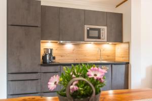 Kuchyňa alebo kuchynka v ubytovaní Appartements Gadenstätter