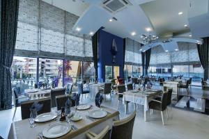 A restaurant or other place to eat at Alaiye Resort & Spa Hotel - Ultra All Inclusive