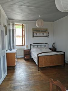 Ліжко або ліжка в номері L Oustal du Malbernat