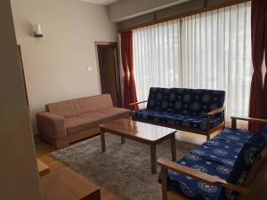 Posezení v ubytování Khamsum Inn