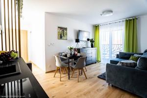Posezení v ubytování Villa Łeba Pokoje & Apartamenty