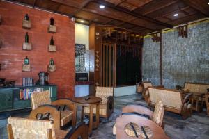 Część wypoczynkowa w obiekcie Urbanview Hotel Syariah Wisnugraha by RedDoorz