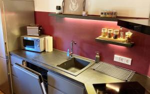 Kuchyň nebo kuchyňský kout v ubytování TS Apartments