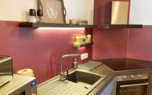 Kuchyň nebo kuchyňský kout v ubytování TS Apartments