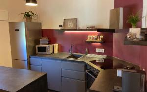 Kuchyň nebo kuchyňský kout v ubytování TS Apartments