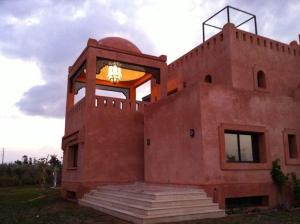 a building with a large window on top of it at Villa Marrakech in Marrakesh