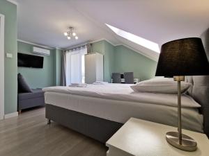 Ліжко або ліжка в номері Villa Bianco