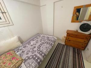 Ένα ή περισσότερα κρεβάτια σε δωμάτιο στο EL Fouly Villa with beach front فيلا لمة العيله الفولي - سيدي كرير