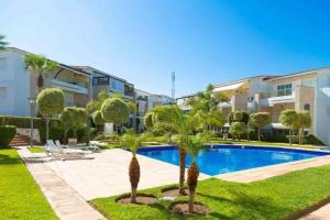 Afbeelding uit fotogalerij van TAMARIS LES PERLES Rez de Jardin in Tamaris