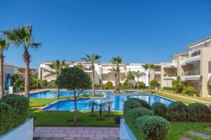 Afbeelding uit fotogalerij van TAMARIS LES PERLES Rez de Jardin in Tamaris