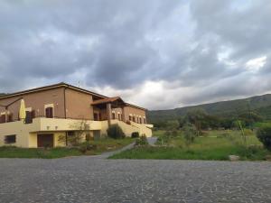 a building on the side of a road at Marrubiu Resort Note di Stelle in Marrùbiu