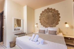 Postel nebo postele na pokoji v ubytování Hotel Magdalena