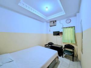 TV a/nebo společenská místnost v ubytování Hotel Taman Sari