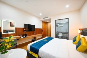TV a/nebo společenská místnost v ubytování PLUS VUNG TAU HOTEL