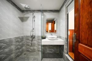 Koupelna v ubytování PLUS VUNG TAU HOTEL