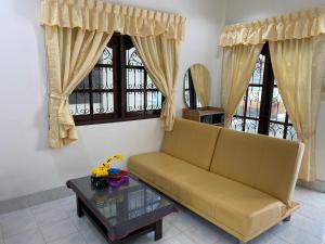 Posezení v ubytování Vacation Home Tambon Karon