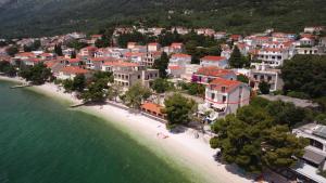 an aerial view of a town on a beach at Lux Gradac in Gradac