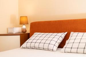 Letto o letti in una camera di Apartments Melody