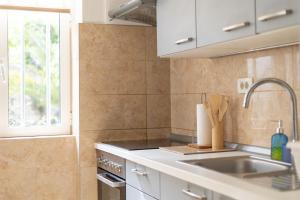Cucina o angolo cottura di Apartments Melody