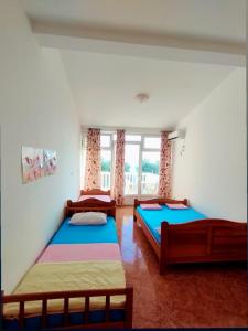 Postel nebo postele na pokoji v ubytování Joksimović apartmani