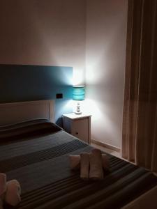 Letto o letti in una camera di Mare e Sabbia