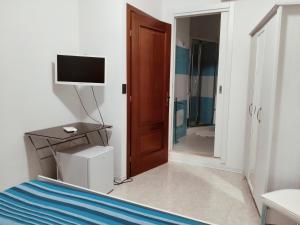 TV a/nebo společenská místnost v ubytování Mare e Sabbia