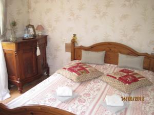 Postel nebo postele na pokoji v ubytování Hotel Le Commerce