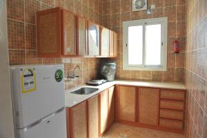 Una cocina o cocineta en Amasy Al Waha