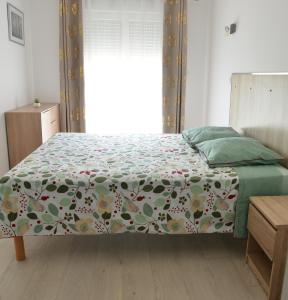 Katil atau katil-katil dalam bilik di Domaine de l’Herbe Sainte