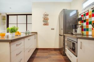 Kuchnia lub aneks kuchenny w obiekcie Rocio Anexo by IVI Real Estate