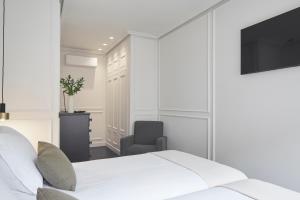 TV a/nebo společenská místnost v ubytování Pitipombo by FeelFree Rentals