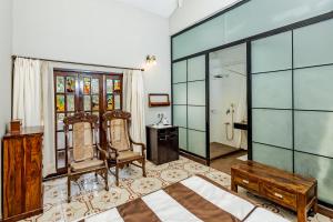 The Tamarind Hotel - A Boutique Heritage Stay, Anjuna - Goa客房内的一张或多张床位