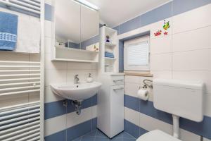 Kúpeľňa v ubytovaní Rona Apartment JM 38