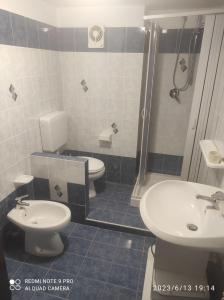 Koupelna v ubytování Appartamento Rocche Rosse