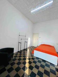 Cama o camas de una habitación en Palazzo Storico Mileto