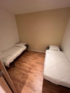 Postel nebo postele na pokoji v ubytování Villa Belle Vue Ambleteuse